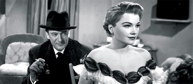George Sanders et Anne Baxter dans Eve (1951)
