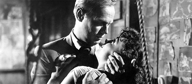Richard Widmark et Jean Peters dans Le Port de la Drogue (1952)