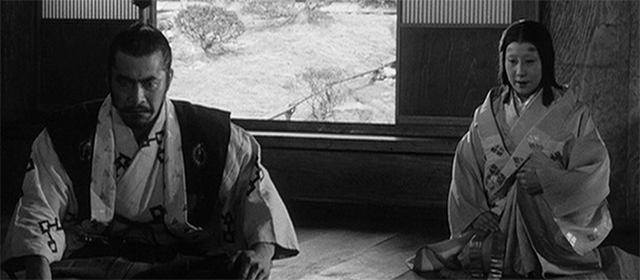 Toshirô Mifune et Isuzu Yamada dans Le Château de l'Araignée (1957)