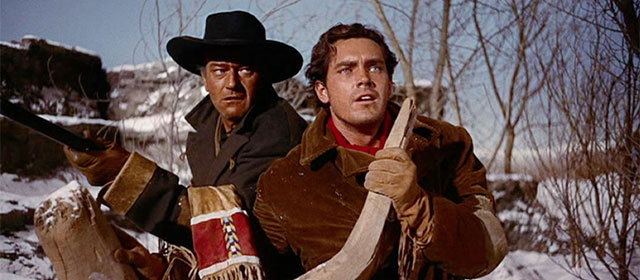 John Wayne et Jeffrey Hunter dans La Prisonnière du désert (1956)